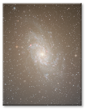 A freshly opened astroimage may have a vignetting hot spot and gradients from sky glow